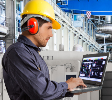 Stressed engineer in industrial automation environment