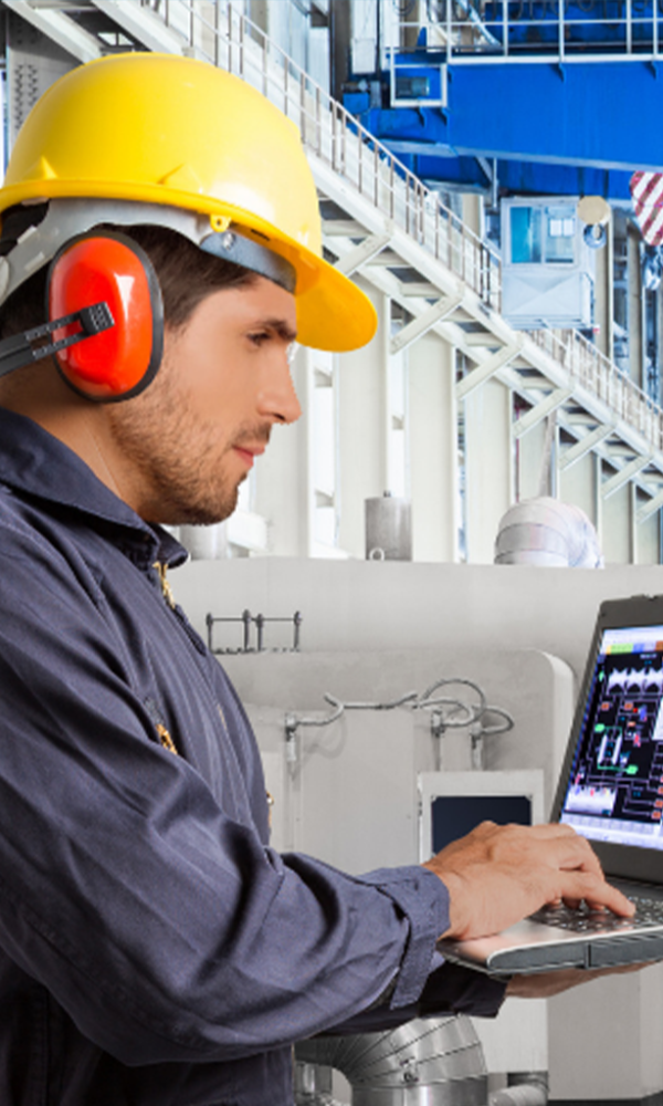 Stressed engineer in industrial automation environment